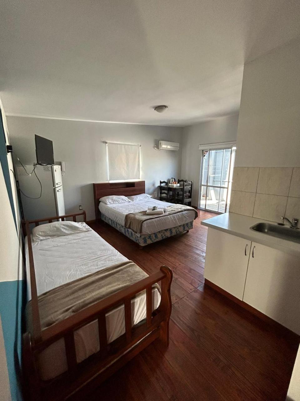 Apartamentos Centro سان سلفادور دي خوخوي الغرفة الصورة